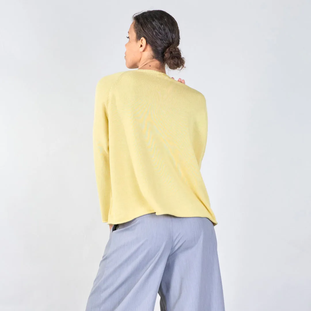 Knit top with button detail and wavy hem wholesale