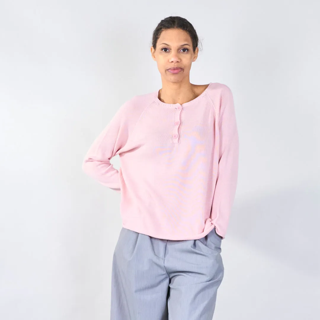 Knit top with button detail and wavy hem wholesale