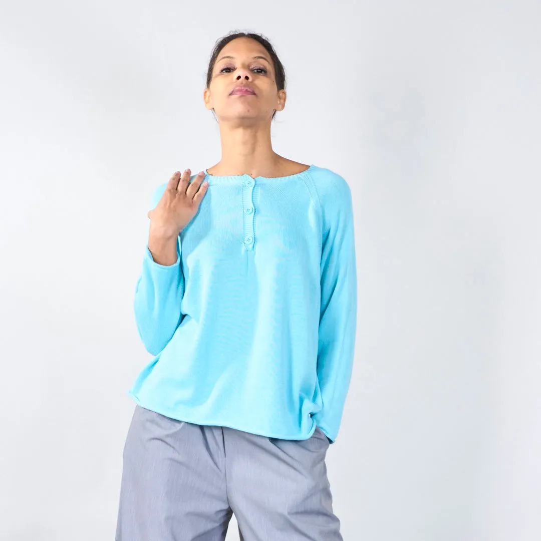 Knit top with button detail and wavy hem wholesale