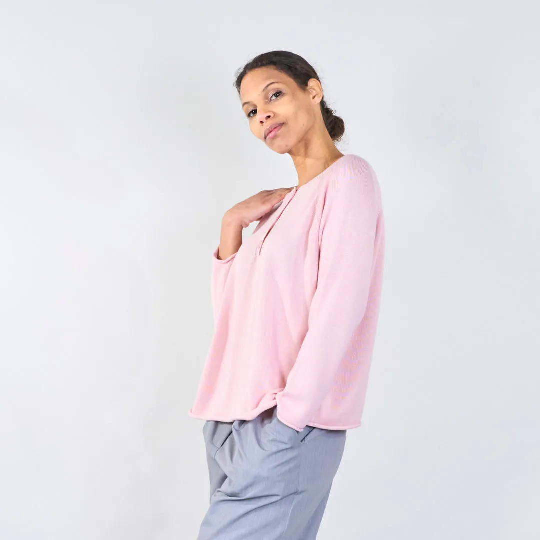 Knit top with button detail and wavy hem wholesale