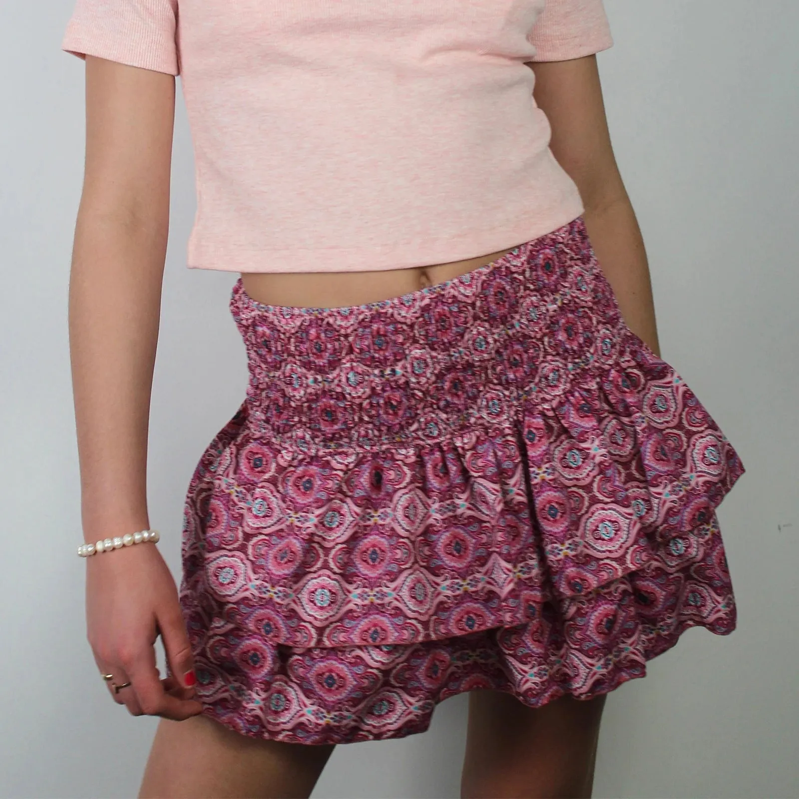 Sunloudy Women's Smocked Ruffle Hem Mini Skirt High Waist Flared Pleated Skater Skirt for Playful Elegance